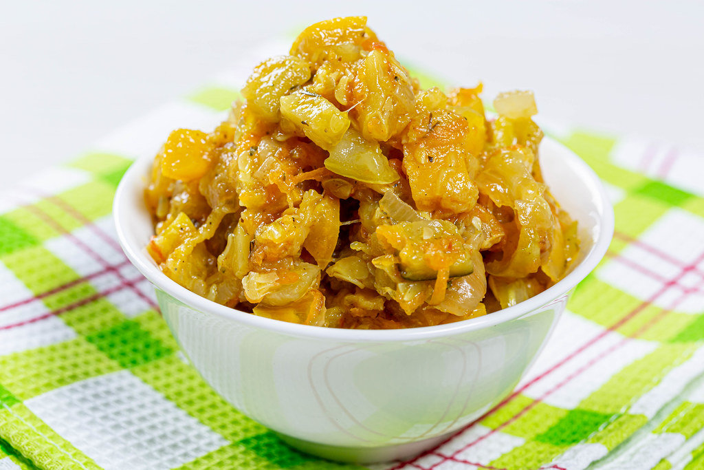 Stew of courgettes in a white bowl