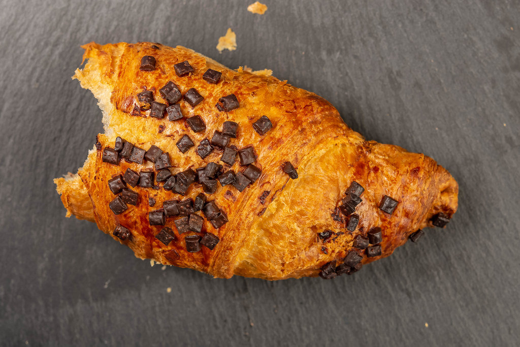 Pastry Croisant with Chocolate Crumbs on the stone tray