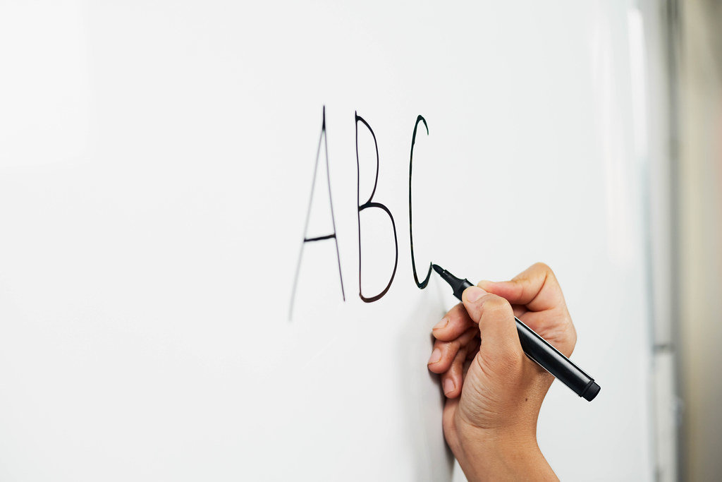 Learning English Alphabet A Teacher Starting First English Lesson For 