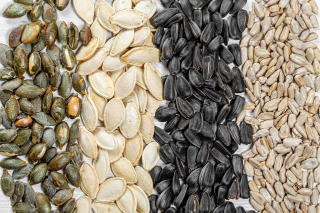 Sunflower and pumpkin seeds-peeled kernels and whole with shells
