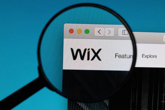 WIX logo under magnifying glass