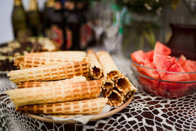 Table With Belgium Waffles And Watermelon