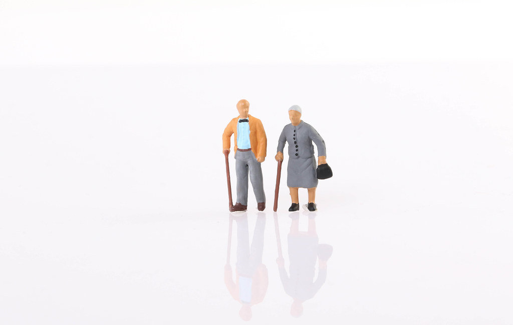 Old couple on white background