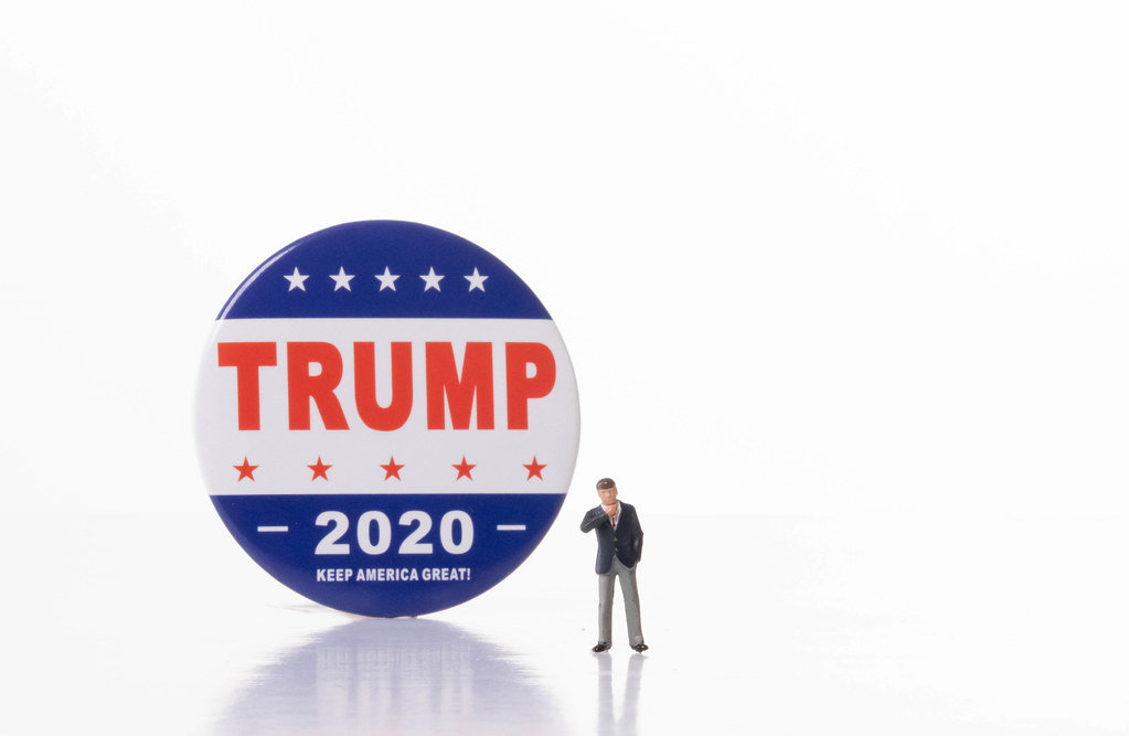 Businessman with Trump 2020 campaign badge