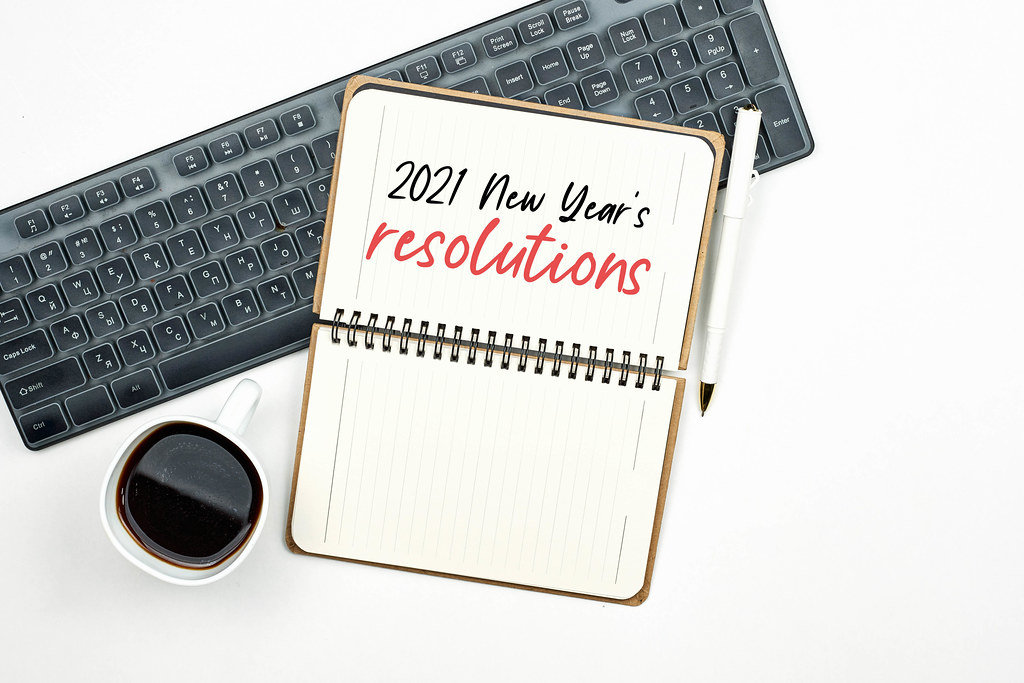 Planning goals for new year in office workspace