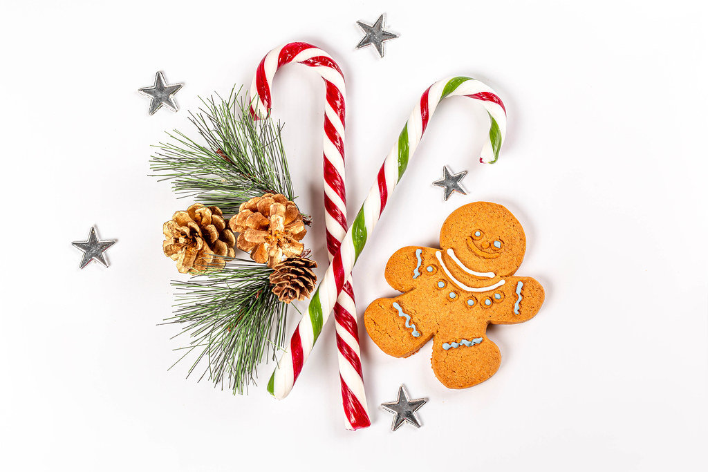 Lollipops cane and gingerbread man with christmas decor