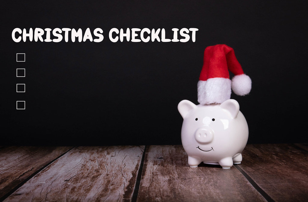 Piggy bank with Christmas hat and Chirstmas Checklist text