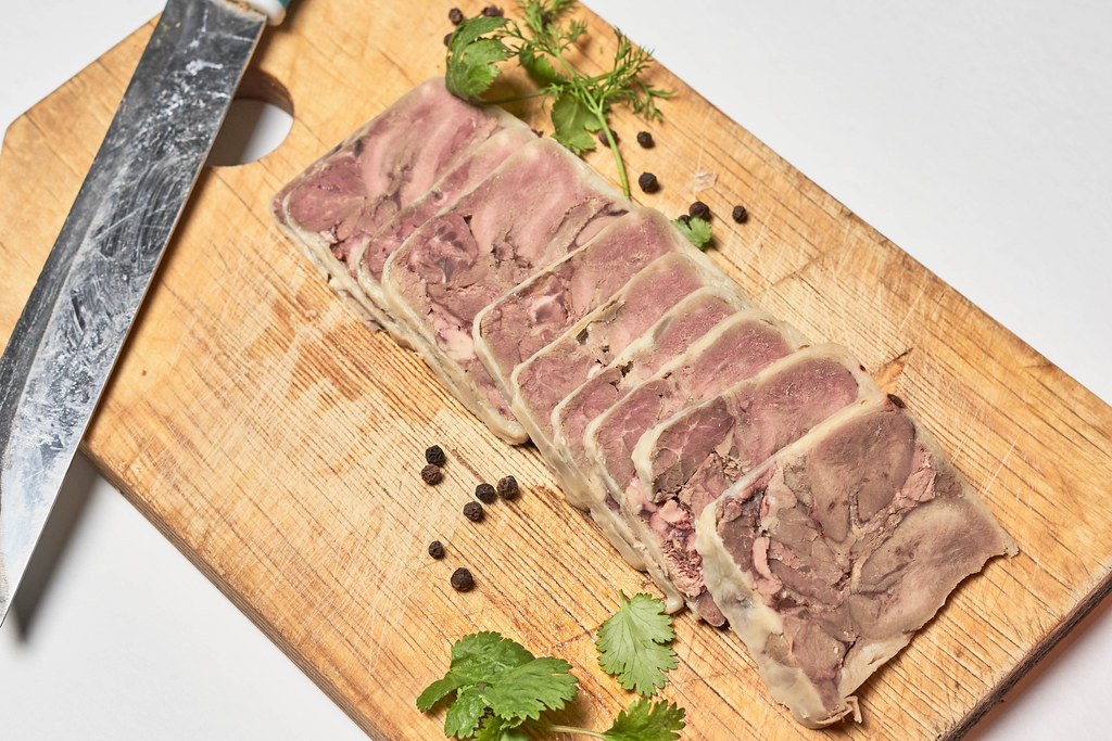 Smoked meat roulette sliced on the cutting board
