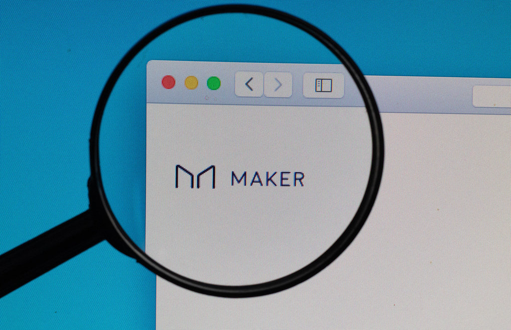 Maker logo under magnifying glass