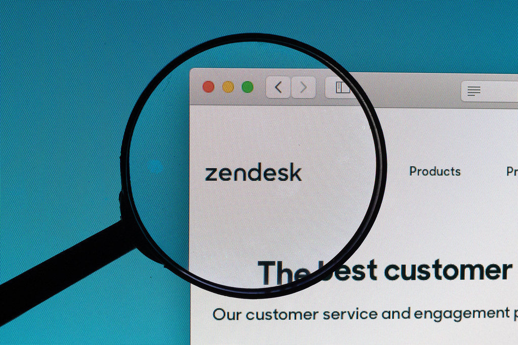 Zendesk logo under magnifying glass