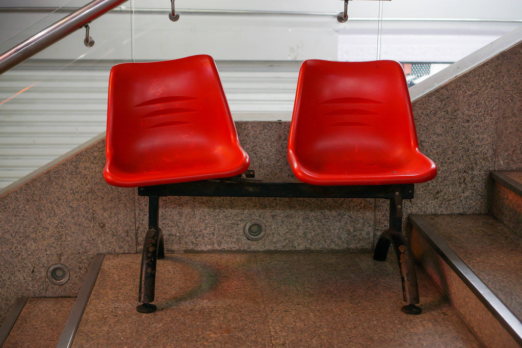 Red Vintage Plastic Seats on Stairs