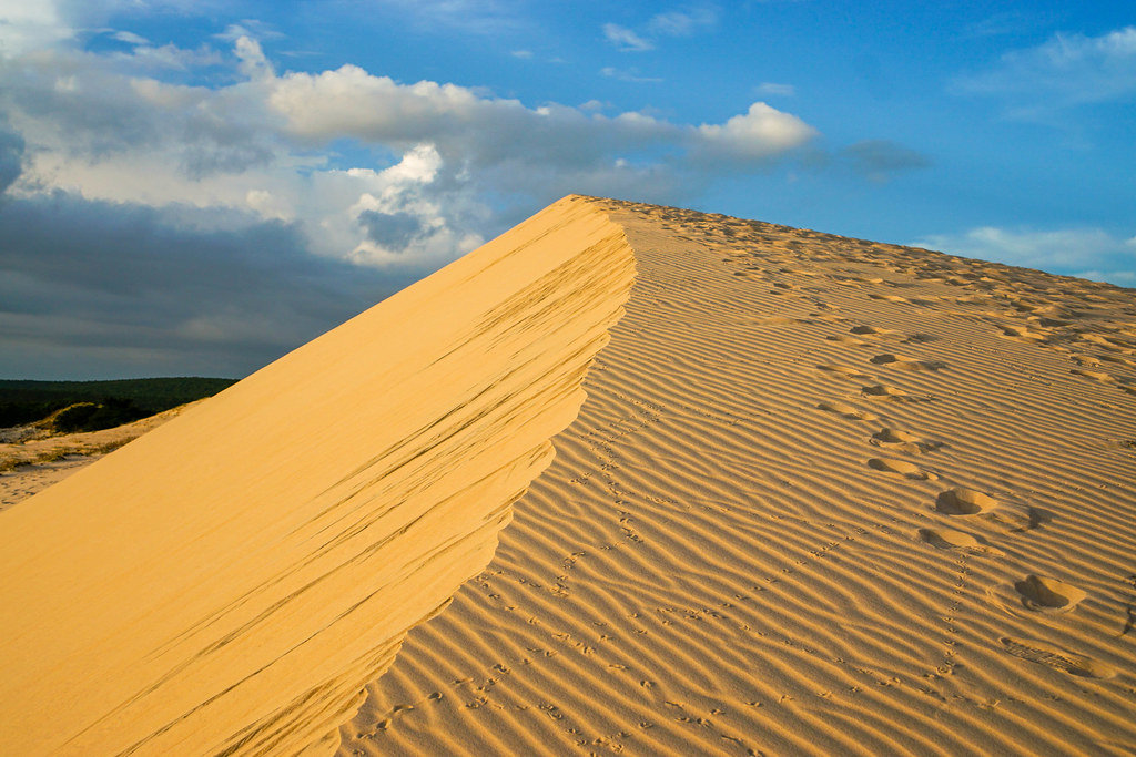 White Sand Dunes in Mui Ne with Sunset Reflection