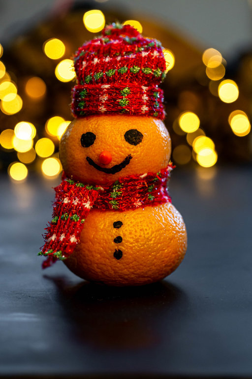 Merry Christmas snowman made from tangerines