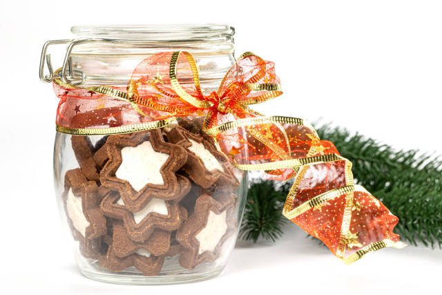 Glass jar with star cookies, close-up
