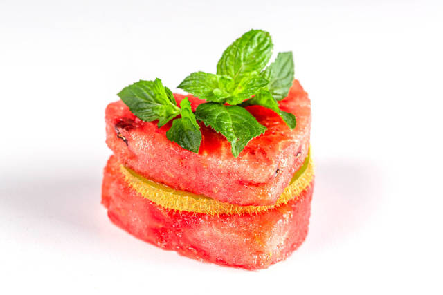 Fruit sandwich with slices of watermelon, kiwi and fresh mint