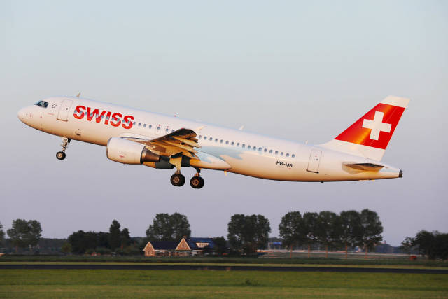 Swiss Air Lines takes off from Amsterdam Airport