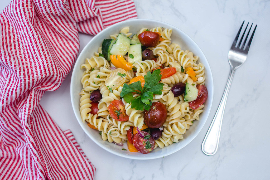 Italian Pasta salad with Vegetables in a White Bowl