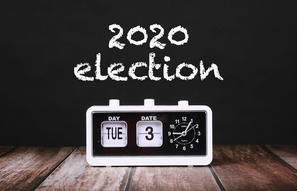 Vintage clock with calendar showing 2020 election date