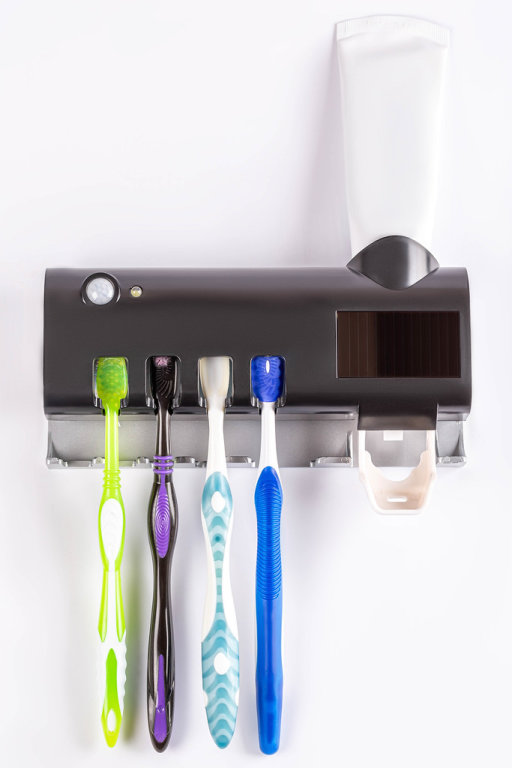 Toothbrush sterilizer with toothpaste and toothbrushes