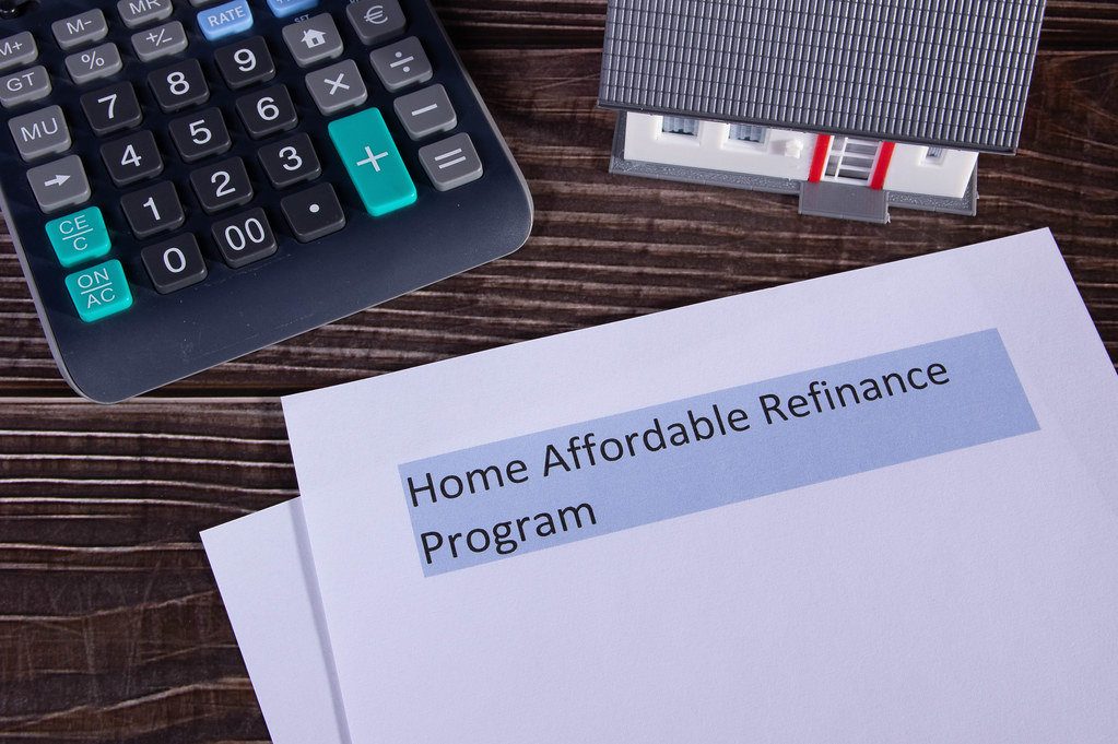 Home Affordable Refinance Program HARP papers on a desk