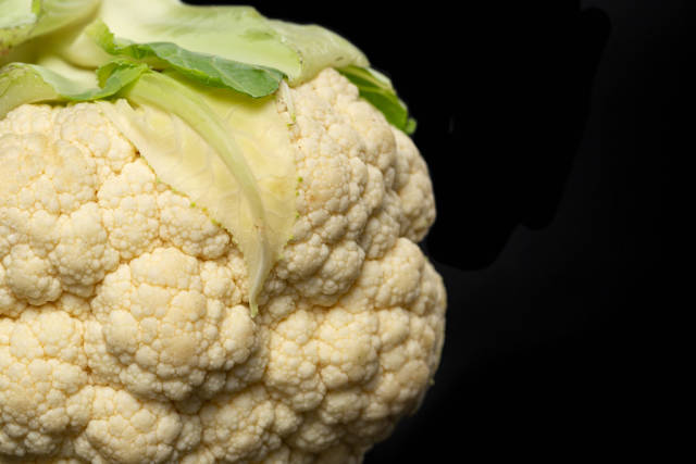 Close-up, cauliflower on a black background