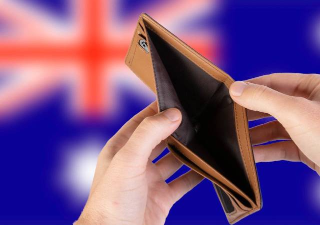 Empty Wallet with Flag of Australia. Recession and Financial Crisis to come with more debt and federal budget deficit?