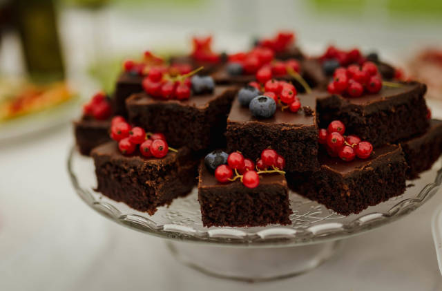 Chocolate Brownies With Berries On The Table