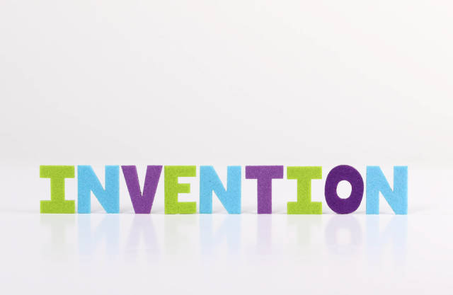 The word Invention on white background