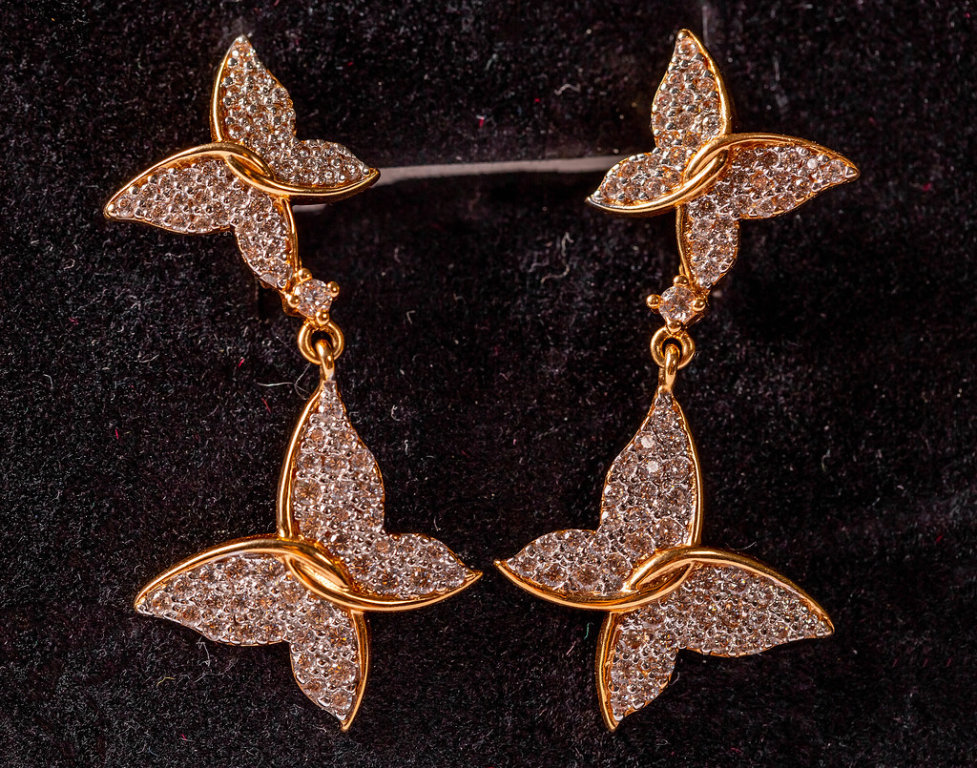 Pair of gold butterfly earrings