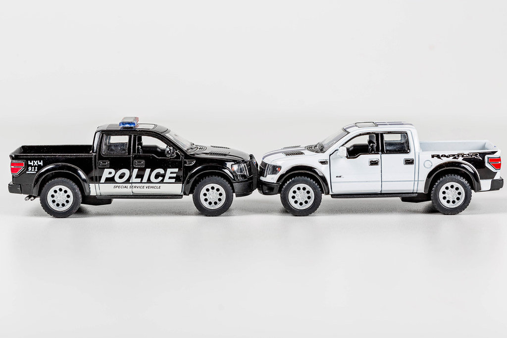 Black police and white metal Pickup car models