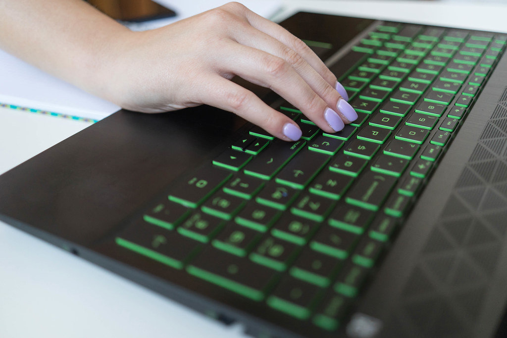 Close Up on Womans Hand on the Laptop