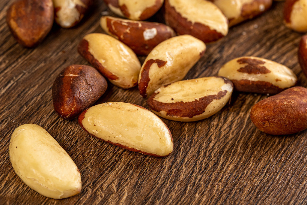 Brazil nuts on a wooden background
