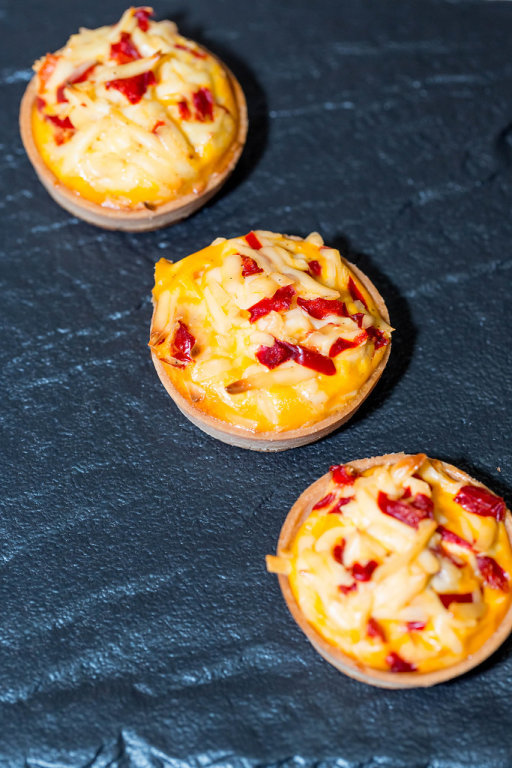 Tartlets baked with cheese