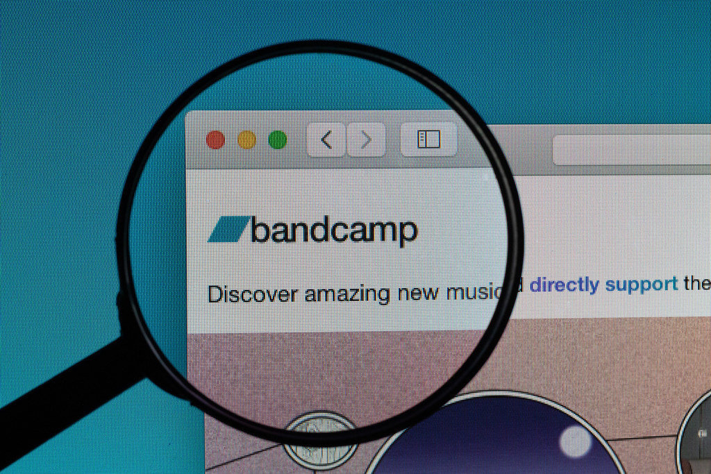 Bandcamp logo under magnifying glass