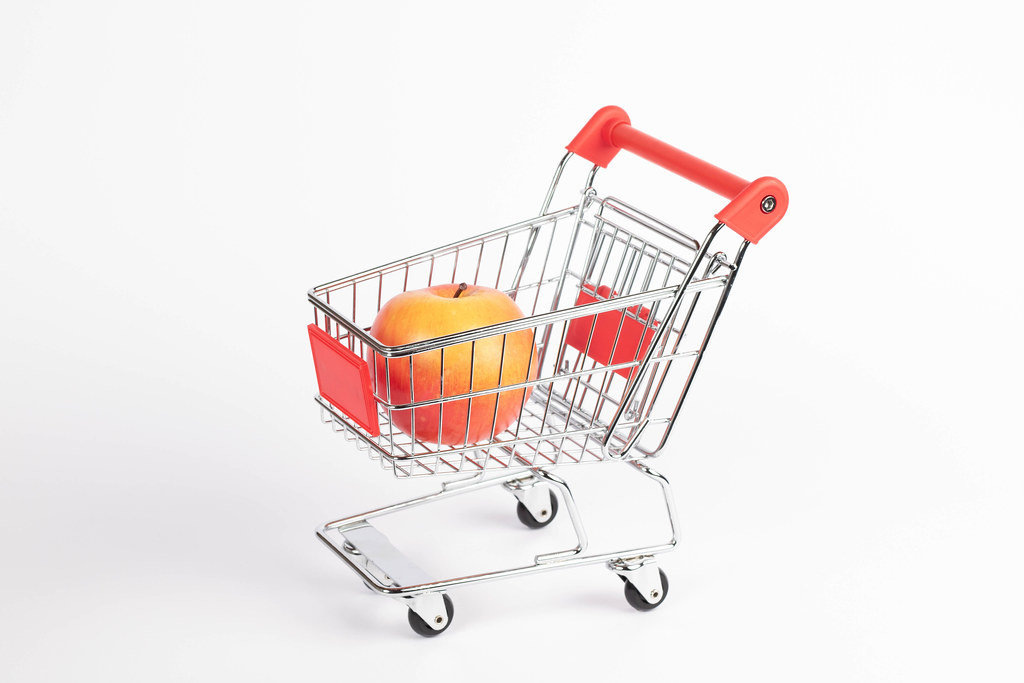 Apple fruit in shopping cart