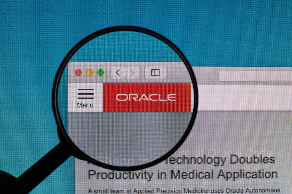 Oracle logo under magnifying glass