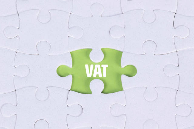 Missing puzzle piece with VAT text