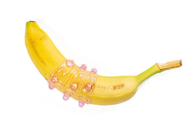Sex toy - pink penis sleeve on banana