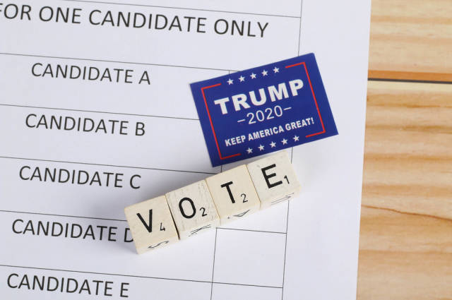 Ballot paper with Trump 2020 sticker and vote text