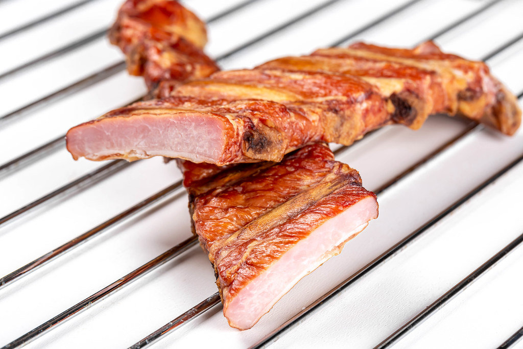 Close-up of fresh, smoked ribs on the grill