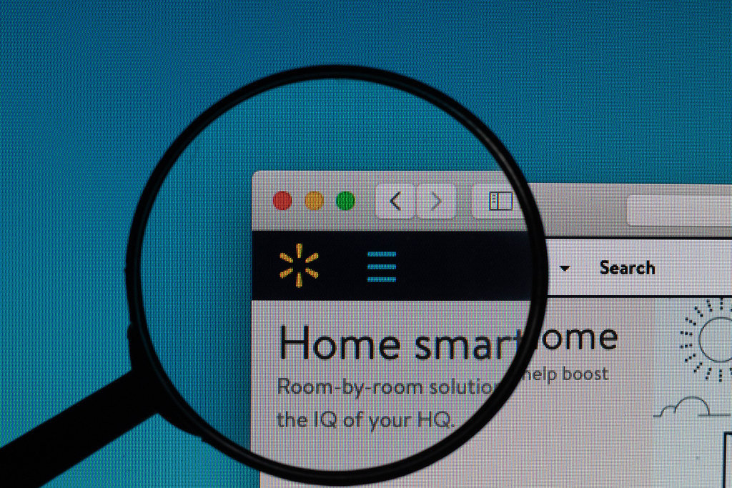 Walmart logo under magnifying glass