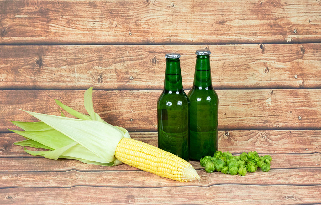 Beer bottles with hops and corn