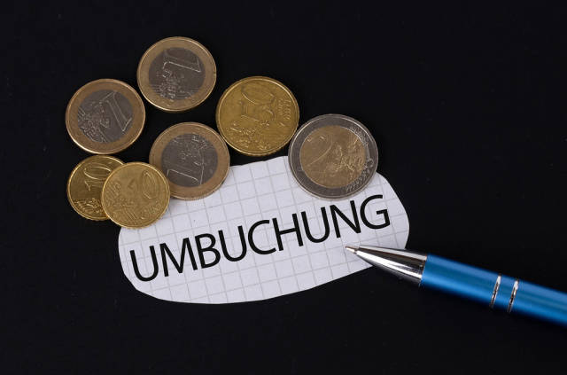 Umbuchung text on piece of paper