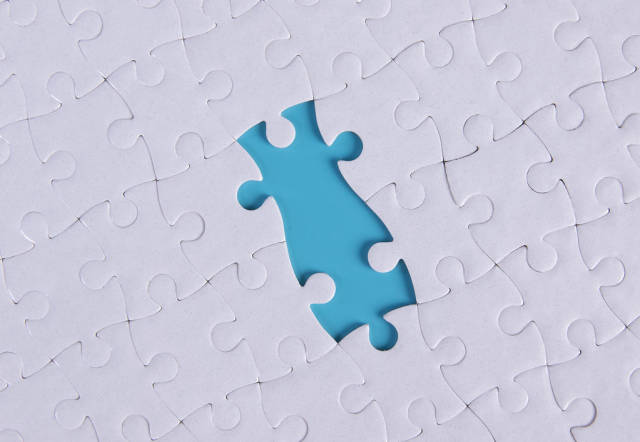 Jigsaw puzzle with two missing pieces