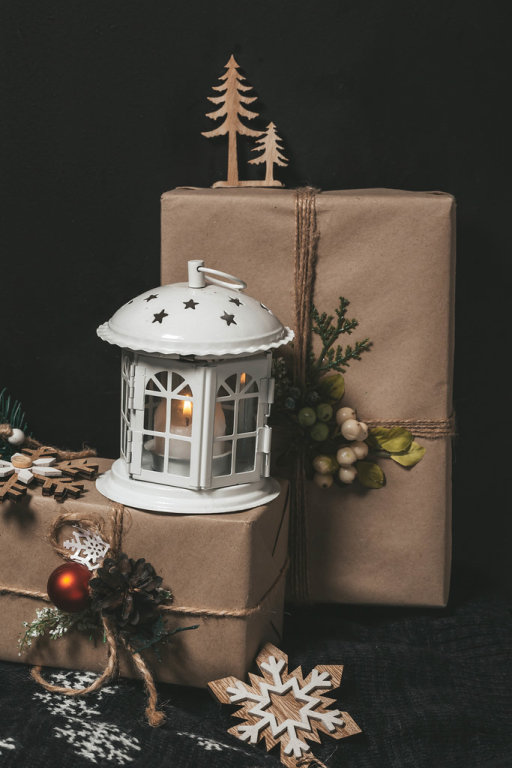 Christmas night background with gifts and lantern