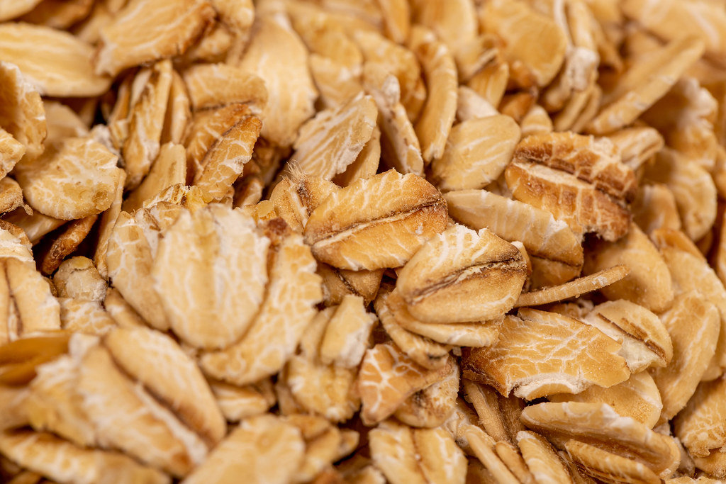 Raw oatmeal flakes close up