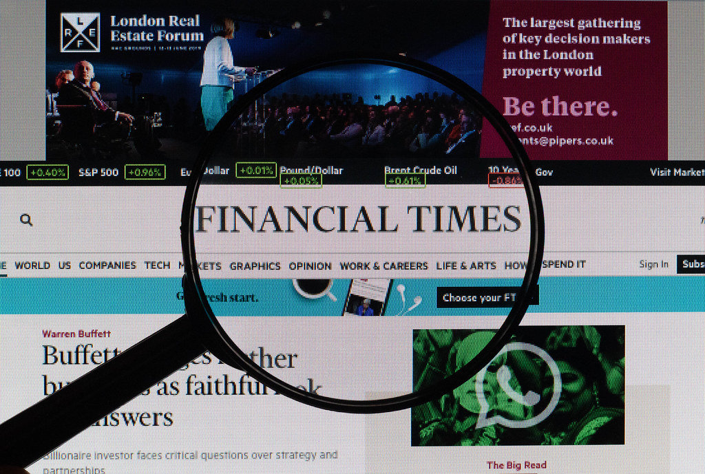 Financial Times logo under magnifying glass