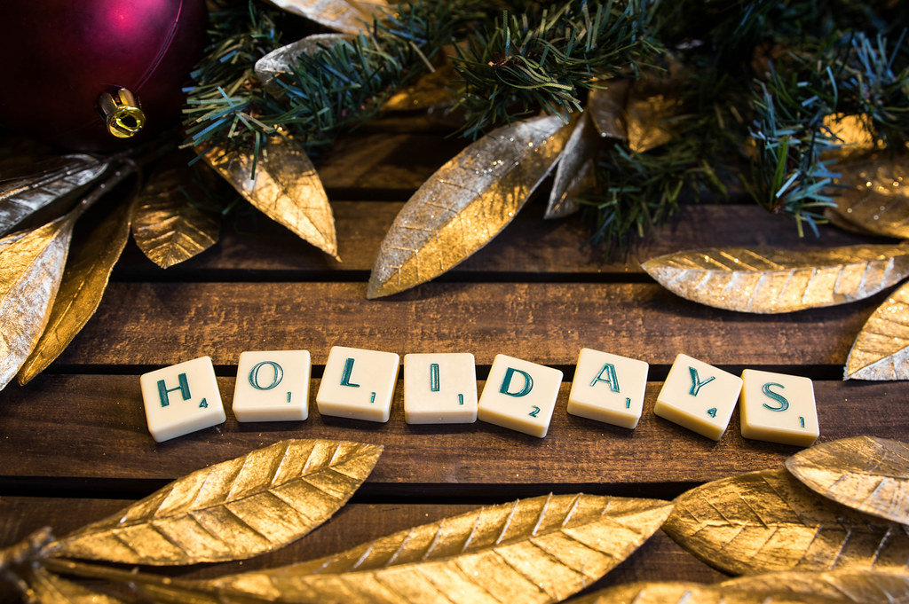 Letters reading HOLIDAYS with christmas decorations