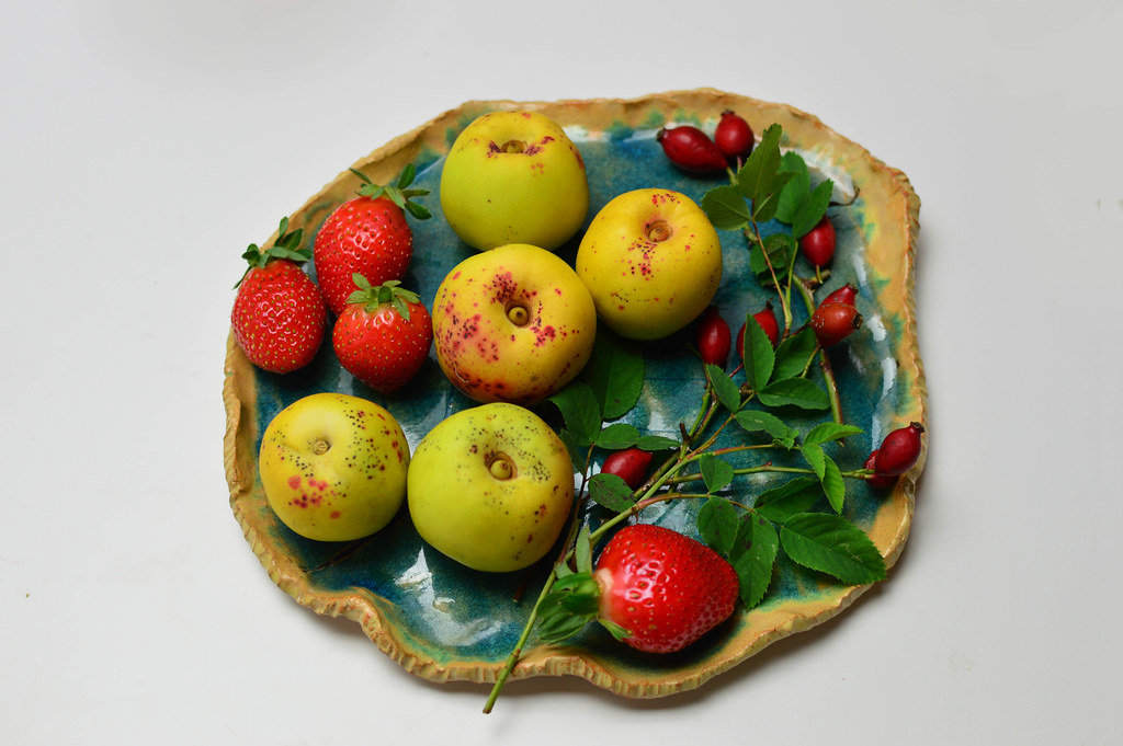 Quince fruit, strawberries and rosehips