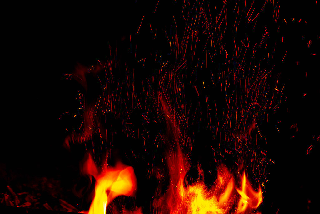 Fire and sparks on a dark night background